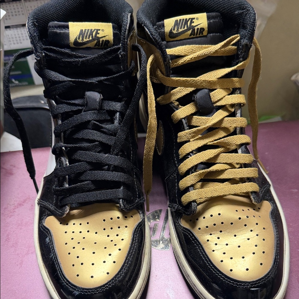 Nike Two-Tone High-Top Sneakers in Black and Gold